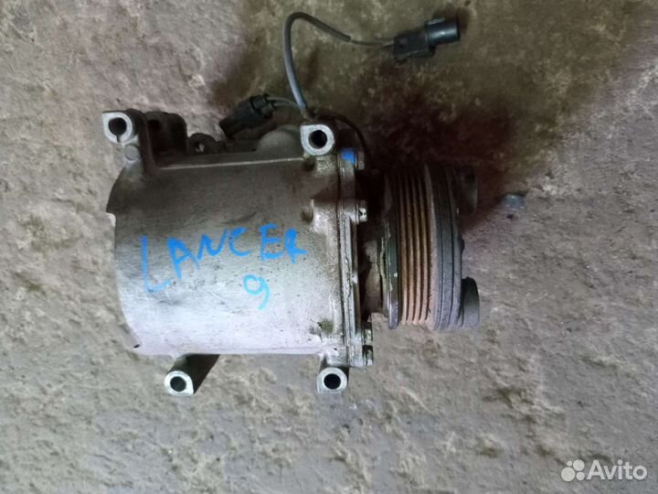 Компрессор кондиционера Mitsubishi Lancer 9