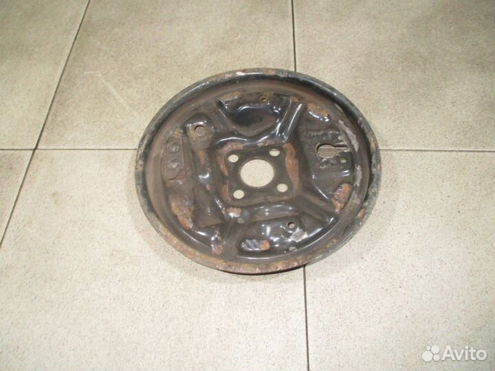 Щит опорный задний левый Renault Logan 1