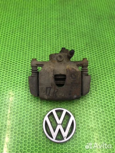 Суппорт тормозной передний левый Volkswagen Polo
