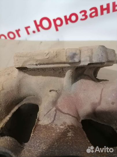 Колектор выпускной Mazda Familia ZL