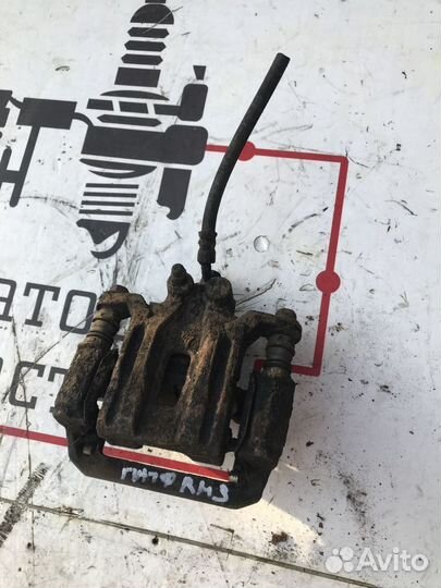 Суппорт тормозной задний правый Nissan Pathfinder