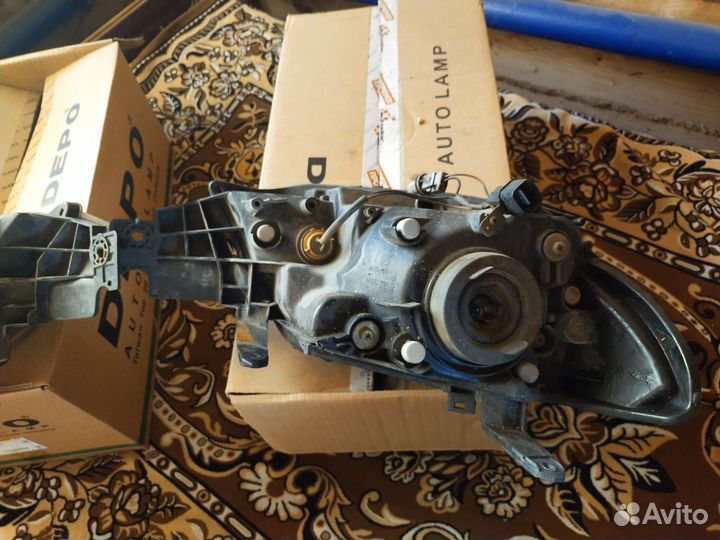 Фары Митсубиси аутлендер 1