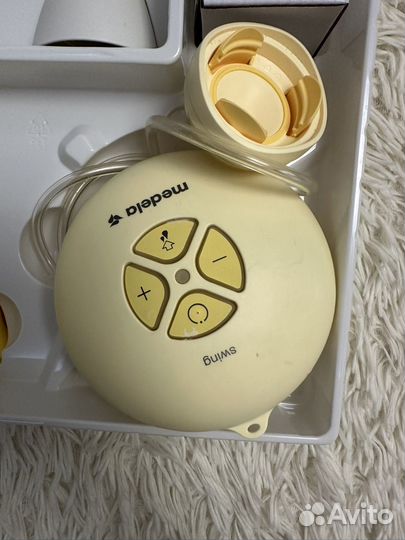 Молокоотсос medela электрический swing flex