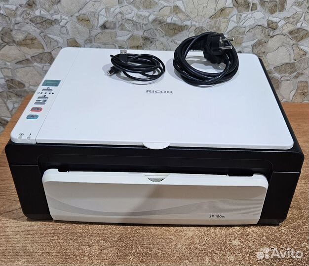Лазерное Мфу Ricoh Aficio SP 100SU