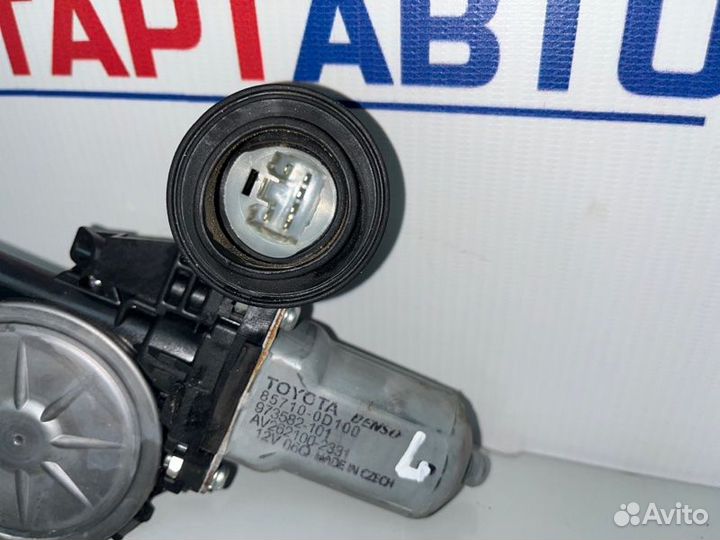 Моторчик стеклоподъемника левый Toyota Corolla
