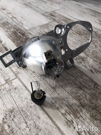 Линза в фару Subaru Legacy