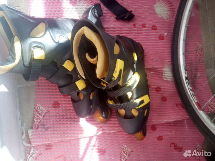 Роликовые коньки