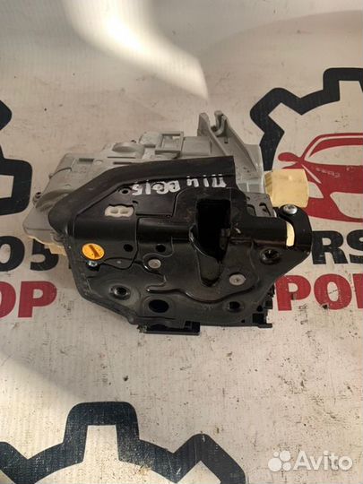 Замок боковой двери передний левый Vw Passat B6