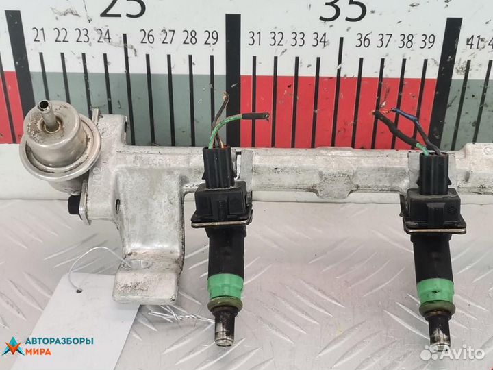 Форсунка Ford Focus 2000 1429840