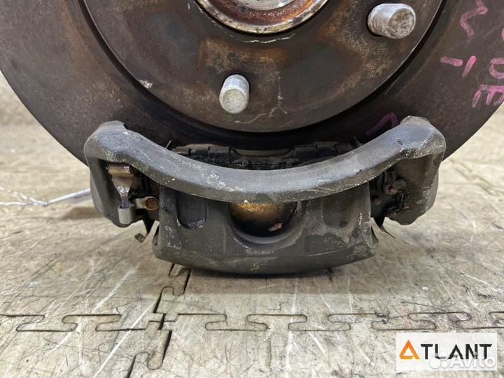 Суппорт передний левый nissan lafesta