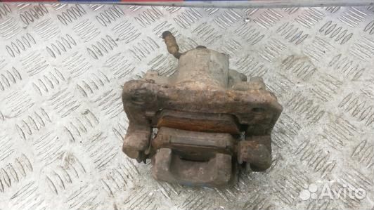 Суппорт тормозной задний левый toyota RAV 4 ZSA3