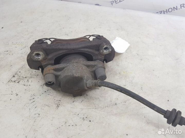 Суппорт тормозной передний левый Renault Megane