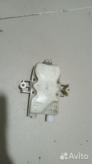 Активатор замка багажника Mitsubishi Outlander