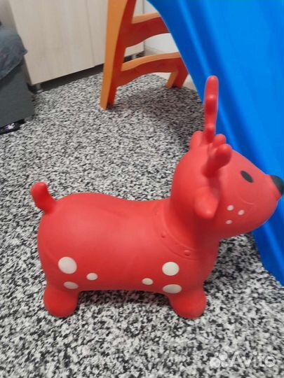 Игрушка Корова прыгунок