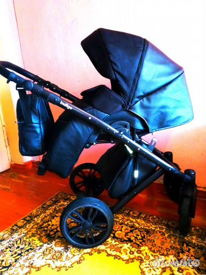 Коляска 2 в 1 эко кожа с надувными колесами