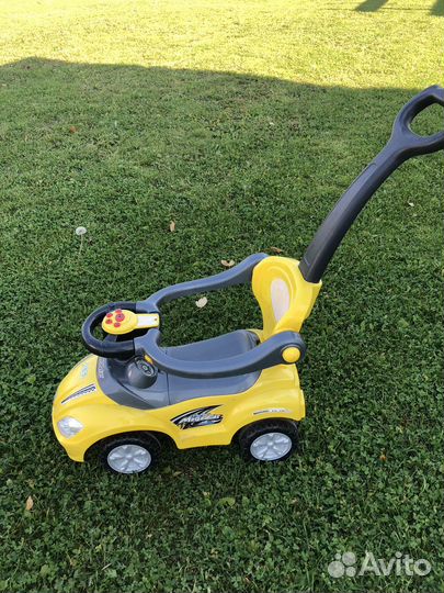 Машинка каталка с ручкой