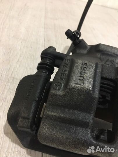 Суппорт тормозной передний левый Mercedes Benz