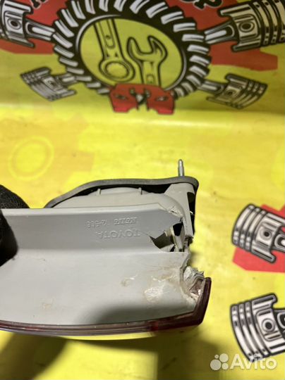 Фонарь левый наружний Toyota Corolla 150 рест