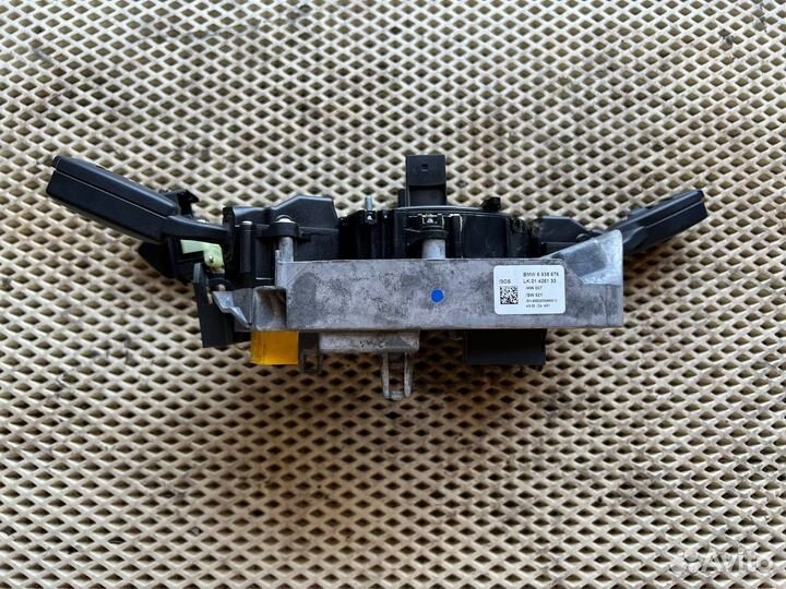 Коммутационный центр в рулевой SZL BMW5 E60