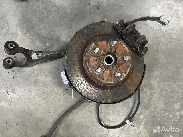 Кулак 28411AL03A задний левый Subaru Outback