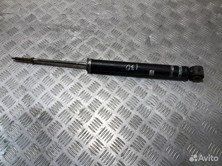 Амортизатор задний правый Nissan Tiida c11