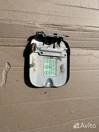 Лючок бензобака Рено Логан 1