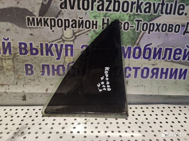 Стекло глухое двери заднее левое Toyota Corolla 15