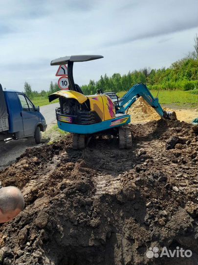 Мини экскаватор,прокол под дорогой