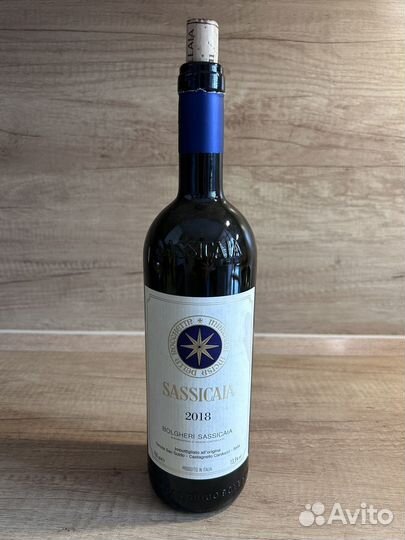 Пустые бутылки от вина Ornellaia и Sassicaia