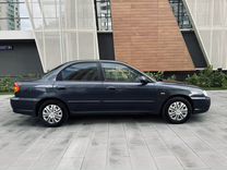 Kia Spectra 1.6 MT, 2006, 218 735 км, с пробегом, цена 265 000 руб.