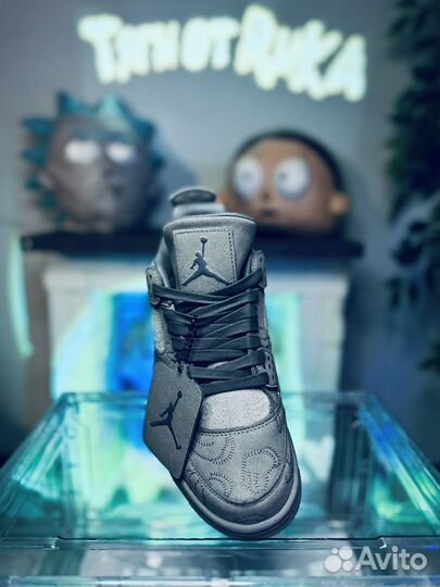 Кроссовки nike air jordan 4 kaws серые