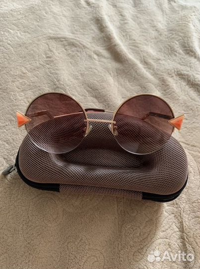 Солнечные очки женские