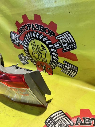 Фонарь левый наружний Toyota Corolla 150 рест