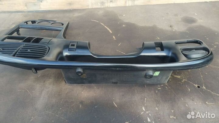 Центральная консоль торпеды Киа Спектра