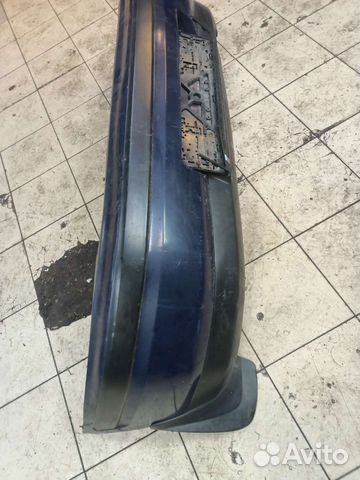 Задний бампер Mazda 323 BG слепая