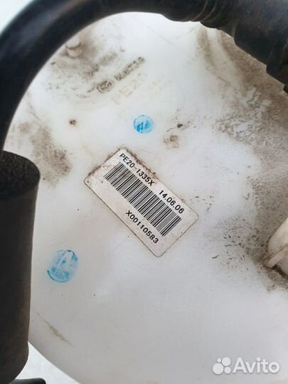 Топливный насос Mazda 3 PE201335X