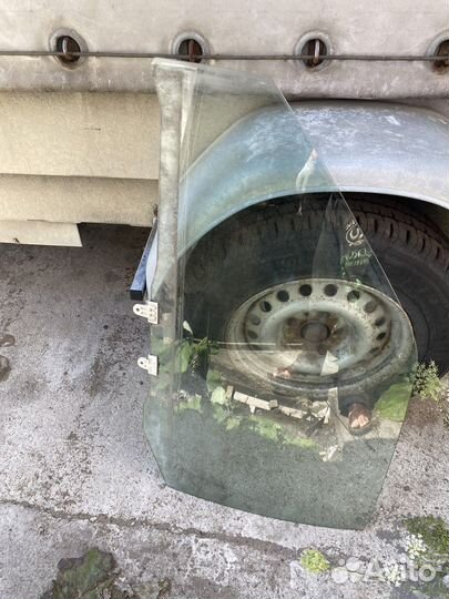 Стекло водительское Ниссан Навара D22