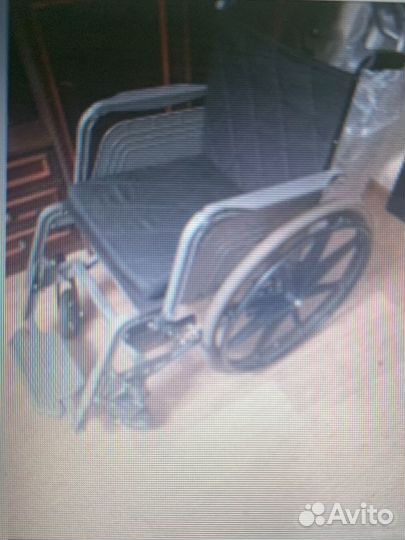 Инвалидная коляска