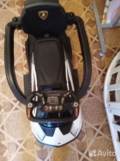 Детская машина каталка с ручкой(токолор)