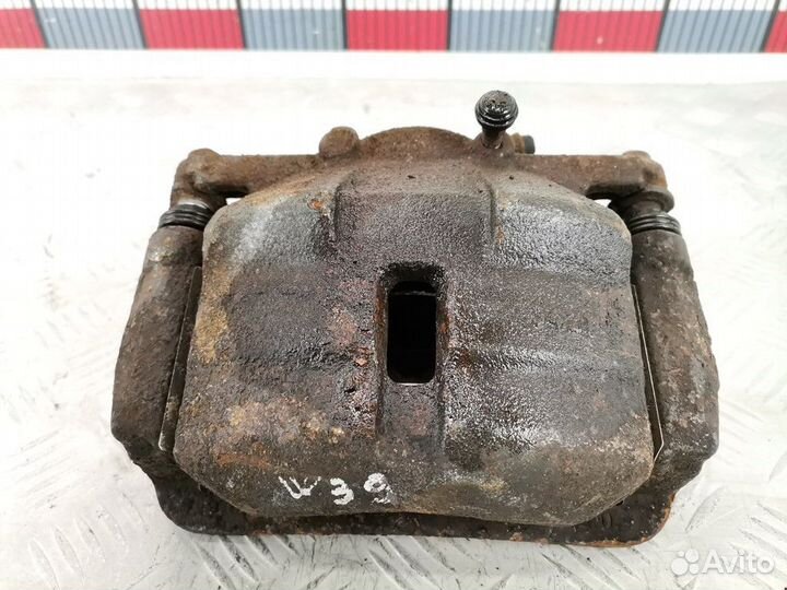 Суппорт передний левый Nissan Qashqai+2 2010