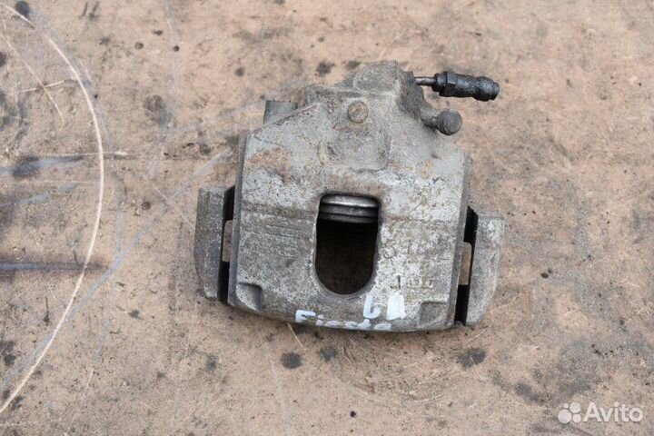 Суппорт тормозной передний левый Ford Fiesta MK5