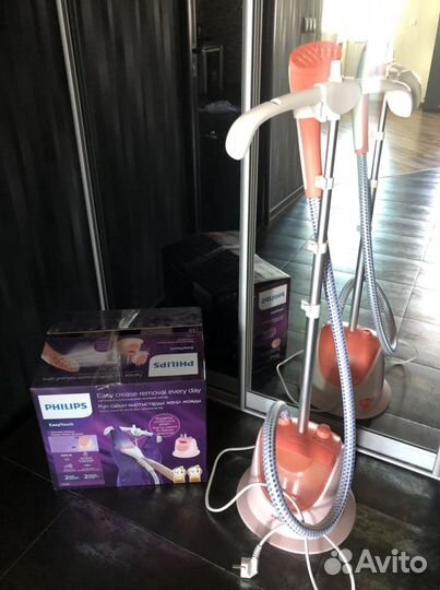 Вертикальный отпариваетесь для одежды Philips