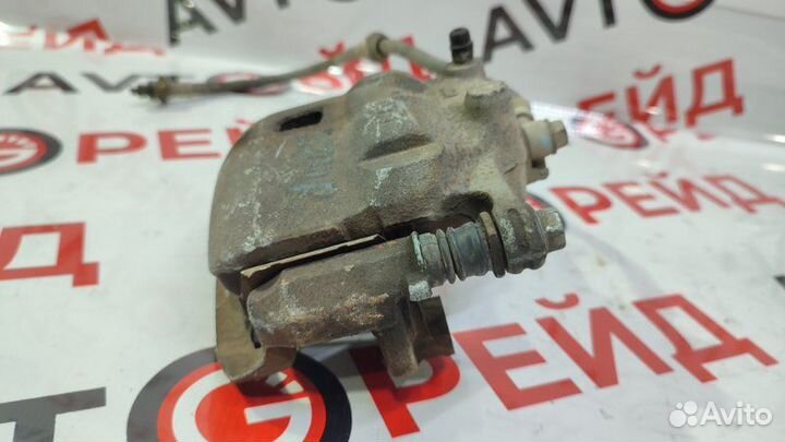 Суппорт тормозной передний правый Nissan Wingroad