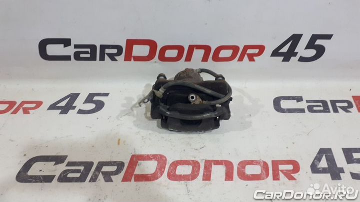 Суппорт передний правый б/у для Toyota Corolla