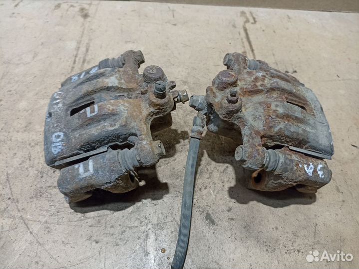 Суппорт тормозной задний Mazda CX-7 I рестайлинг