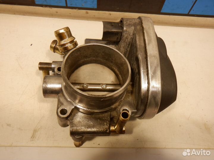 Заслонка дроссельная Opel Astra H Vectra C