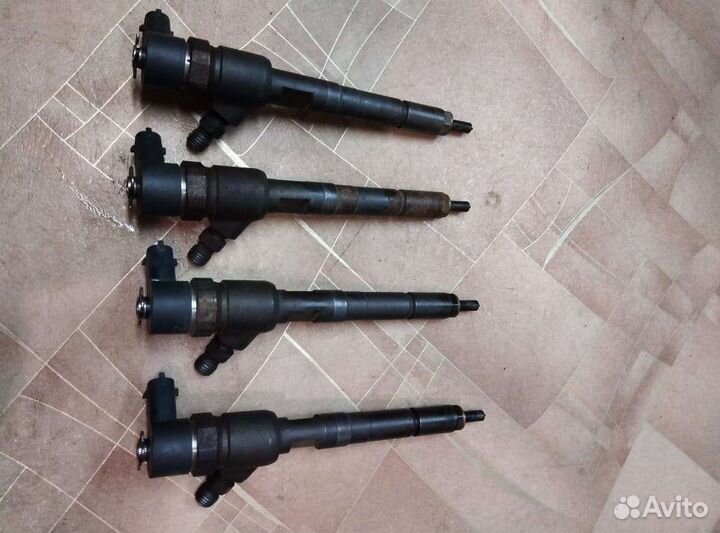 Топливные форсунки z13dtj Opel