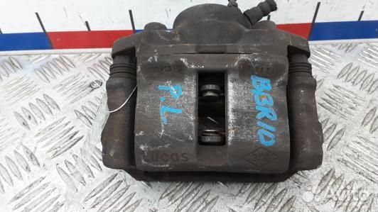 Суппорт тормозной передний левый dacia sandero 1