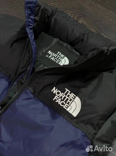 The north face жилетка