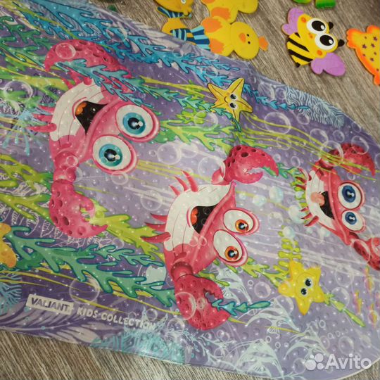 Противоскользящий коврик в ванну